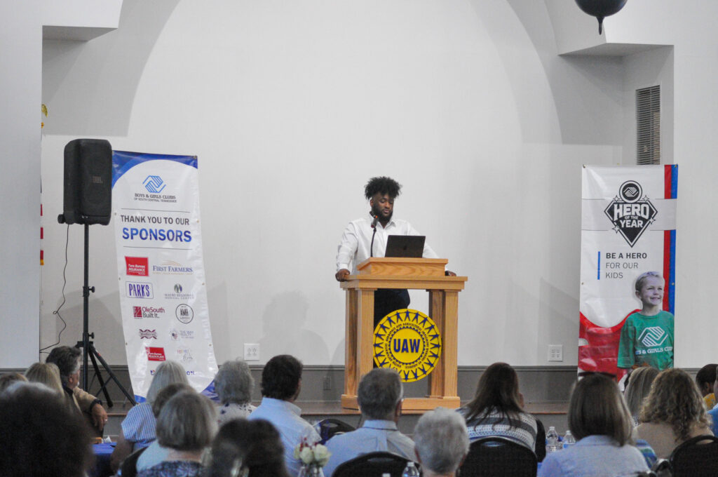 Keynote speaker Mari Ramsey gives an inspiring speech on stage during the 2026 Spring Hill Hero of the Year Celebration.