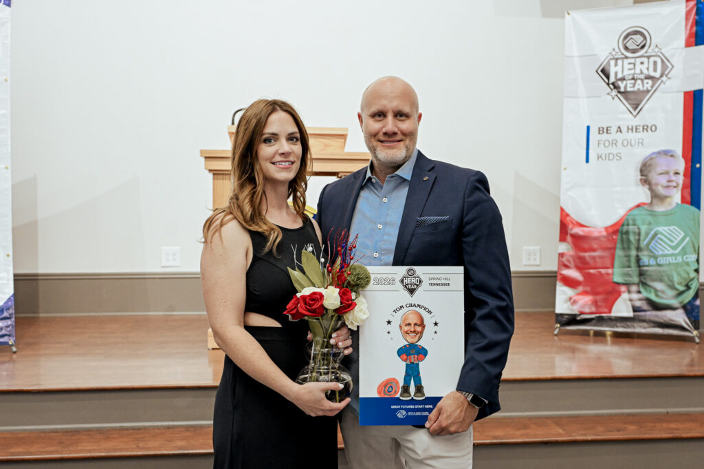 Hero of the Year winner Tom Champion poses for a photo after receiving the award at the 2026 Spring Hill Hero of the Year Celebration.