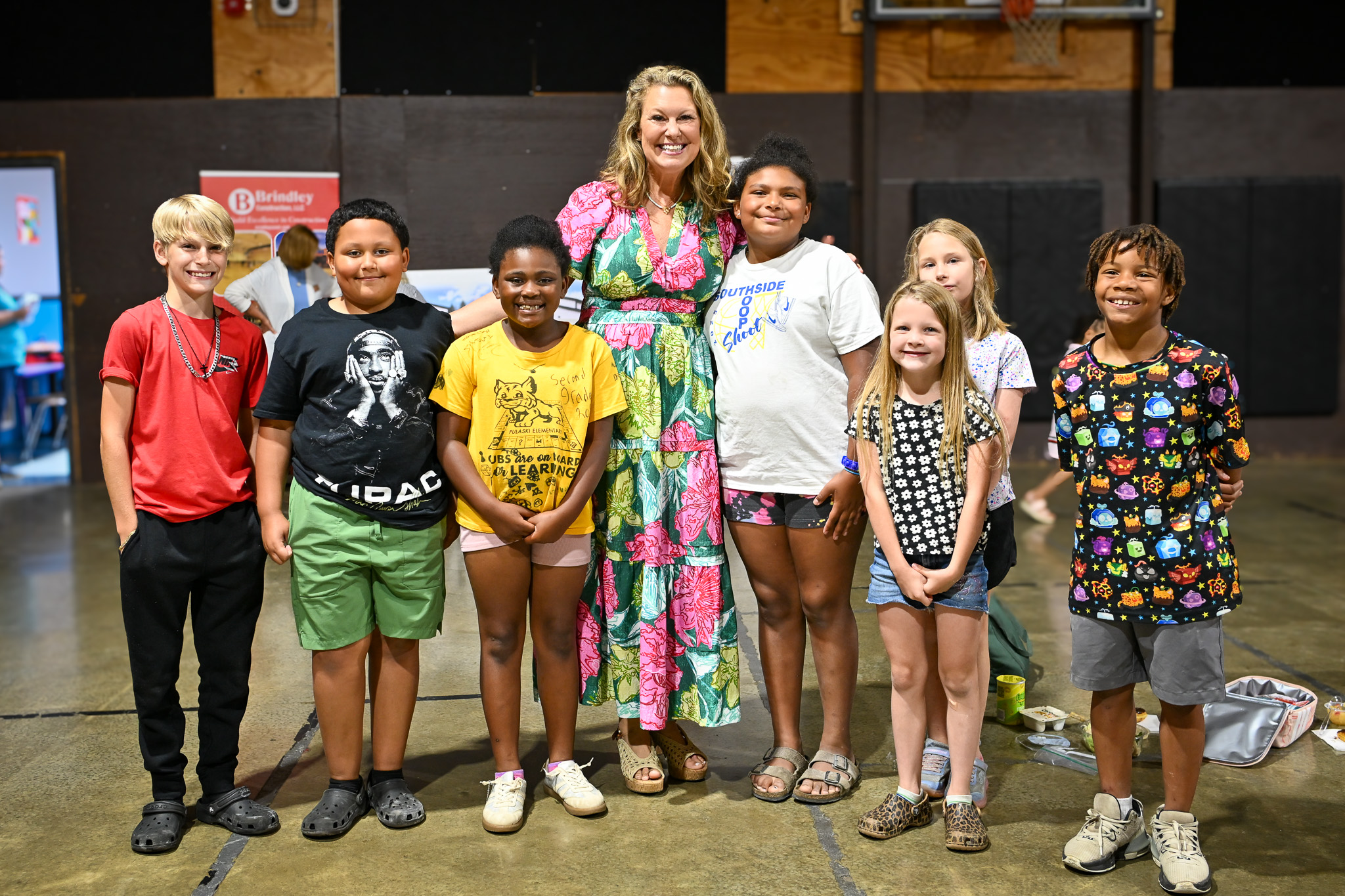 Dr. Alicia Gordon, PAC chair and Pulaski Club Kids pose for a photo