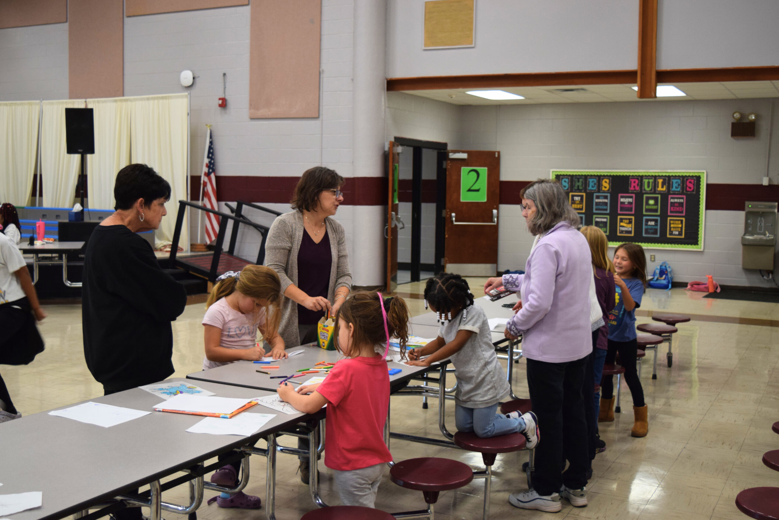 Volunteers engage with BGCSCTN club members at Spring Hill Elementary School