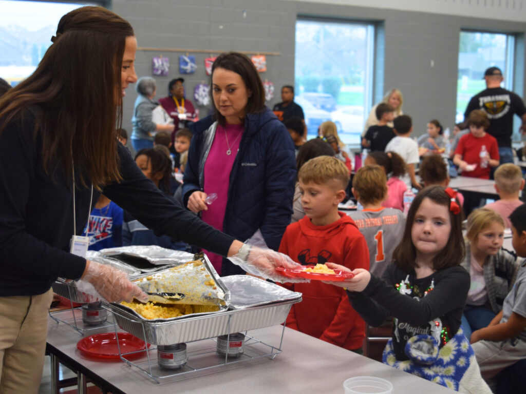 BGCSCTN Thanksgiving 2024 Volunteers serving children hot meals