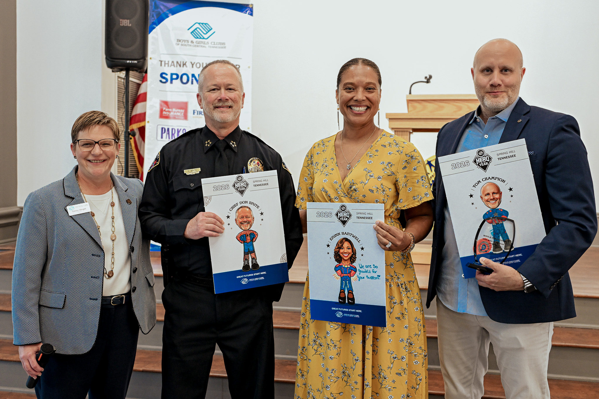 CEO Ginny Wright Poses with Spring Hill hero of the year candidates, Chief Don Brite, Erinn Hartwell and Tom Champion at UAW hall in Spring Hill