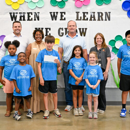 BGCSCTN staff and Club members pose with the Ole South Builders team during a check presentation at Battle Creek Elementary School in Spring Hill.