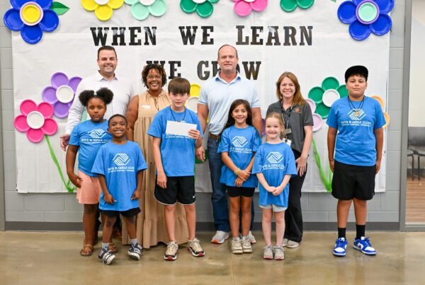BGCSCTN staff and Club members pose with the Ole South Builders team during a check presentation at Battle Creek Elementary School in Spring Hill.