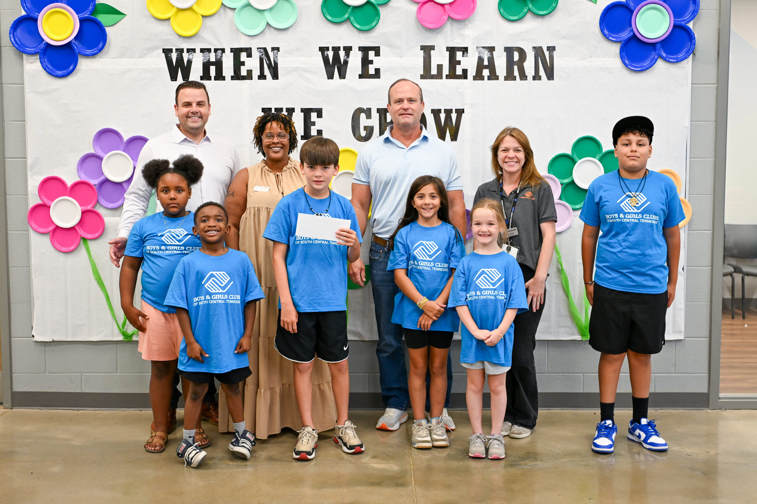 BGCSCTN staff and Club members pose with the Ole South Builders team during a check presentation at Battle Creek Elementary School in Spring Hill.